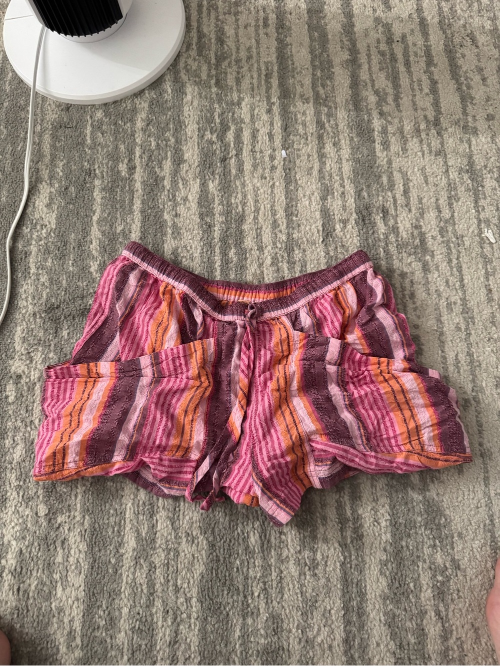 Free people pull on striped shorts